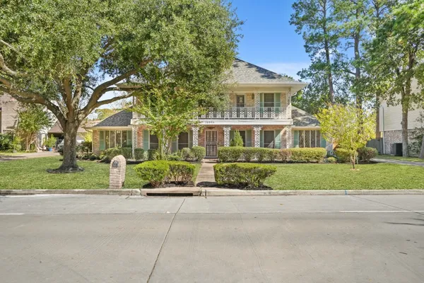 front view of a house with a street