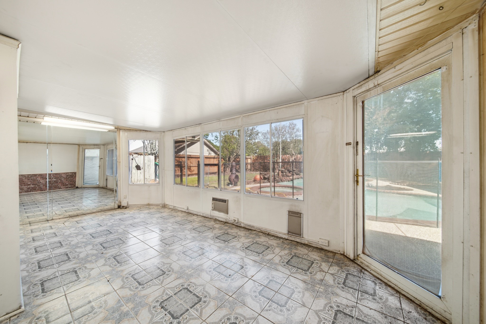 16806 Deep Pines Drive Spring, TX 77379 - Photo 13 of 18 a view of an empty room with a window
