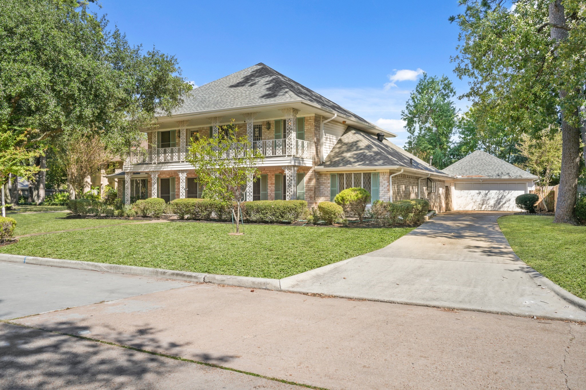 16806 Deep Pines Drive Spring, TX 77379 - Photo 2 of 18 a front view of a house with a yard