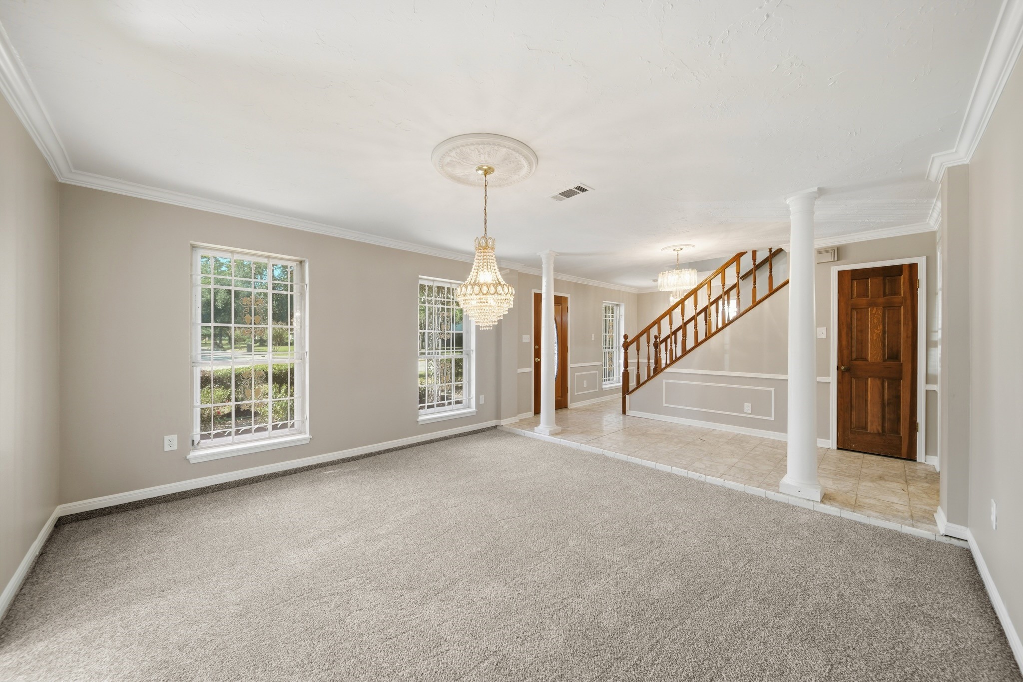 16806 Deep Pines Drive Spring, TX 77379 - Photo 5 of 18 a view of an empty room with stairs