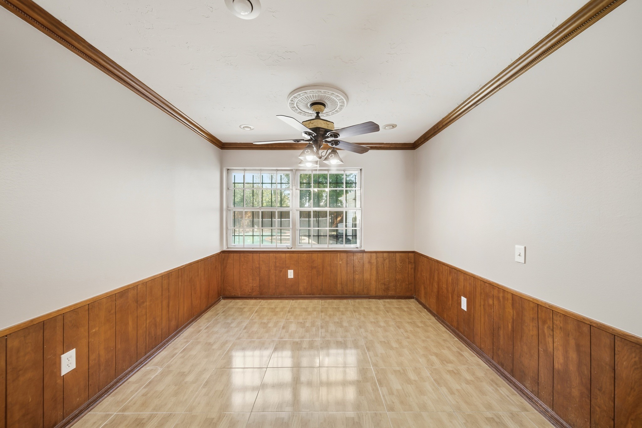 16806 Deep Pines Drive Spring, TX 77379 - Photo 10 of 18 a view of an empty room with a window