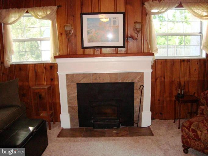 11 Hillcrest Road Riva, MD 21140 - Photo 14 of 28 a living room with furniture and a fireplace