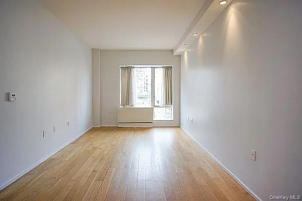 2280 Frederick Douglass Boulevard Manhattan, NY 10027 - Photo 1 of 16 Unfurnished room with light wood-style flooring