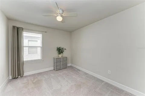 a view of a workspace with furniture