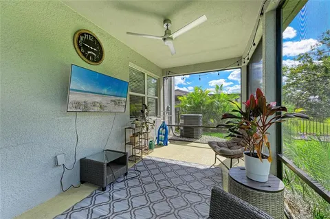 a view of a garden with a building in the background