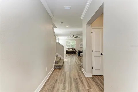 a kitchen with sink refrigerator and window