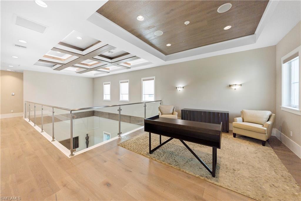 9169 Mercato Way Naples, FL 34108 - Photo 20 of 25 a living room with furniture