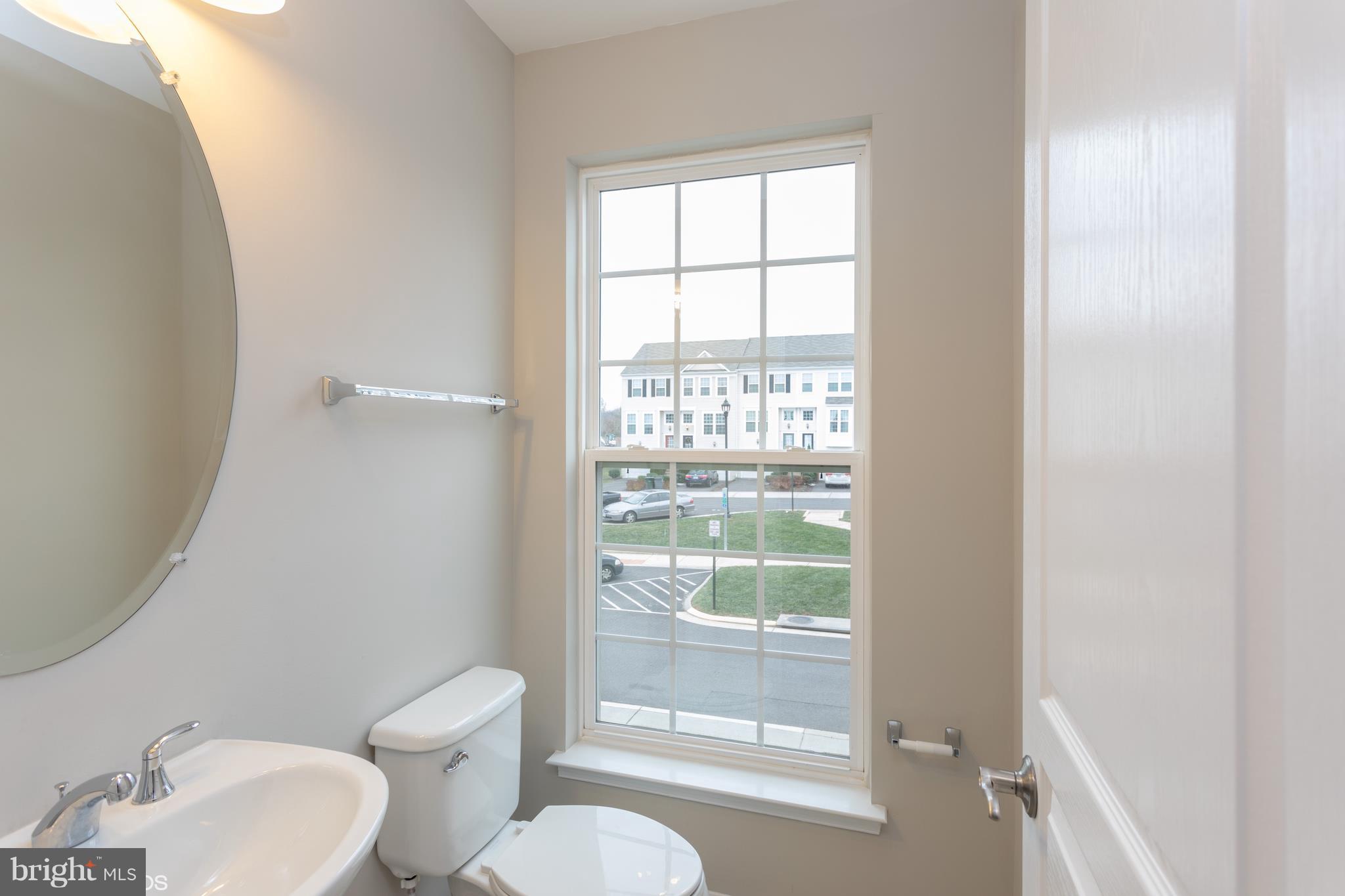 8352 Scotland Loop Manassas, VA 20109 - Photo 13 of 27 Half Bathroom (brand new tile floor)