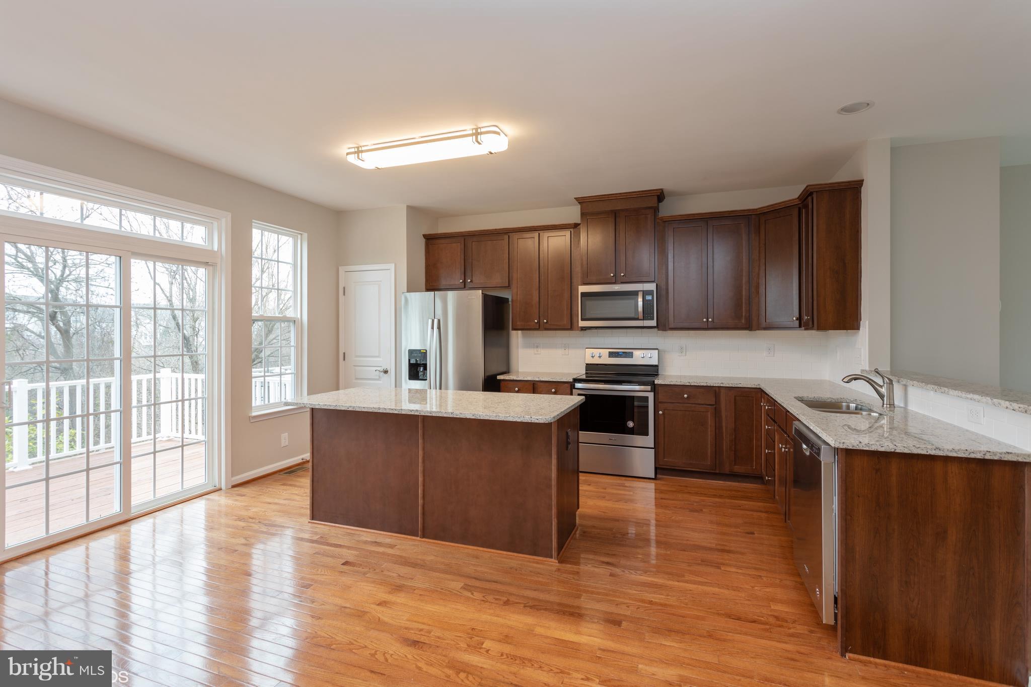 8352 Scotland Loop Manassas, VA 20109 - Photo 7 of 27 Kitchen, new granite, backsplsh & S/S appliances!