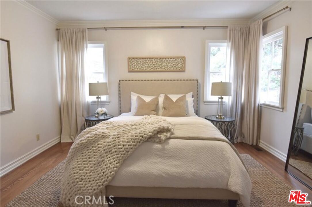 1308 Opechee Way Glendale, CA 91208 - Photo 17 of 33 a bedroom with a bed and a window