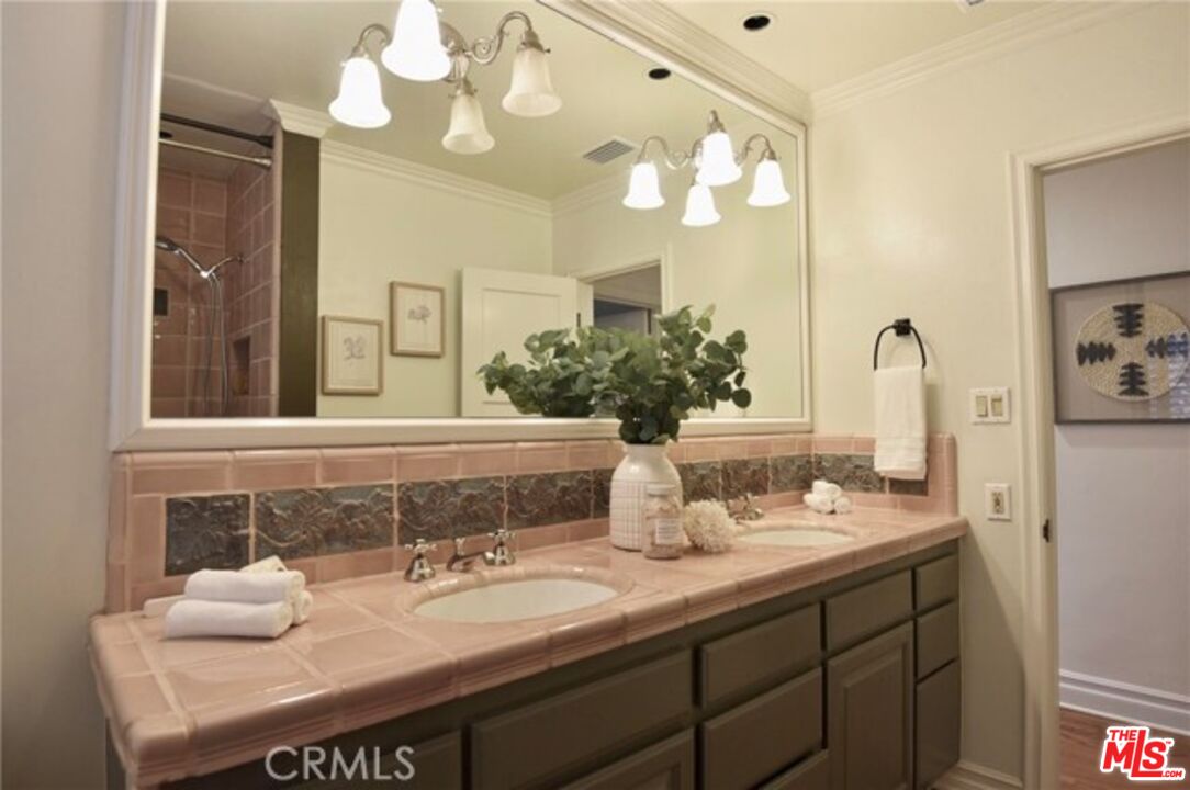 1308 Opechee Way Glendale, CA 91208 - Photo 20 of 33 a bathroom with a sink and a mirror
