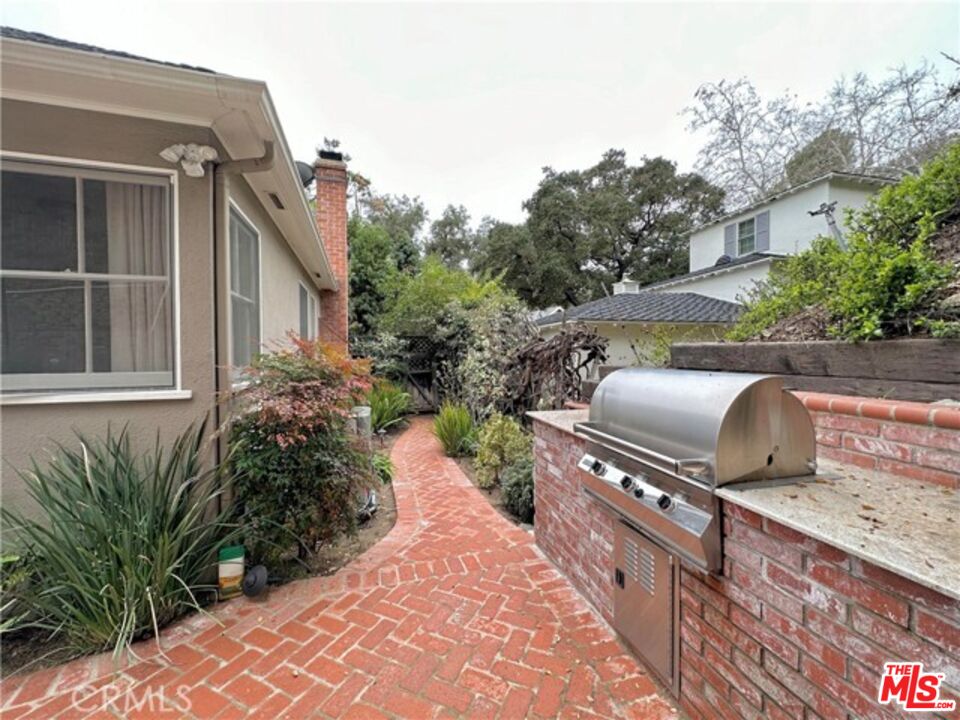 1308 Opechee Way Glendale, CA 91208 - Photo 27 of 33 a couple of cars parked in front of a house