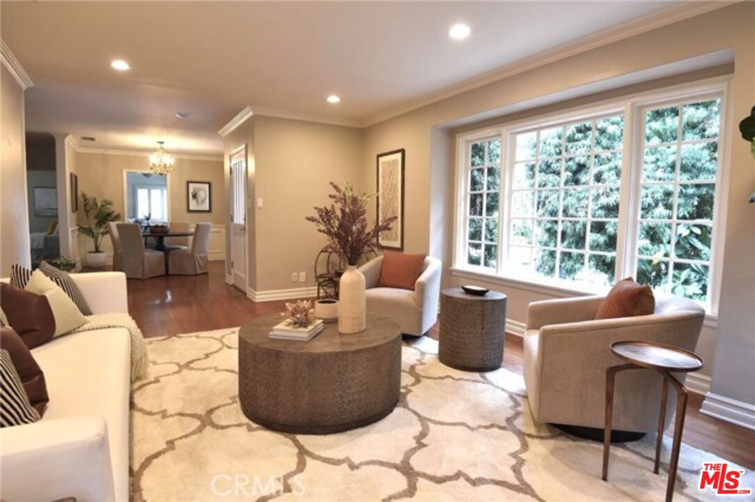 1308 Opechee Way Glendale, CA 91208 - Photo 4 of 33 a living room with furniture and a large window