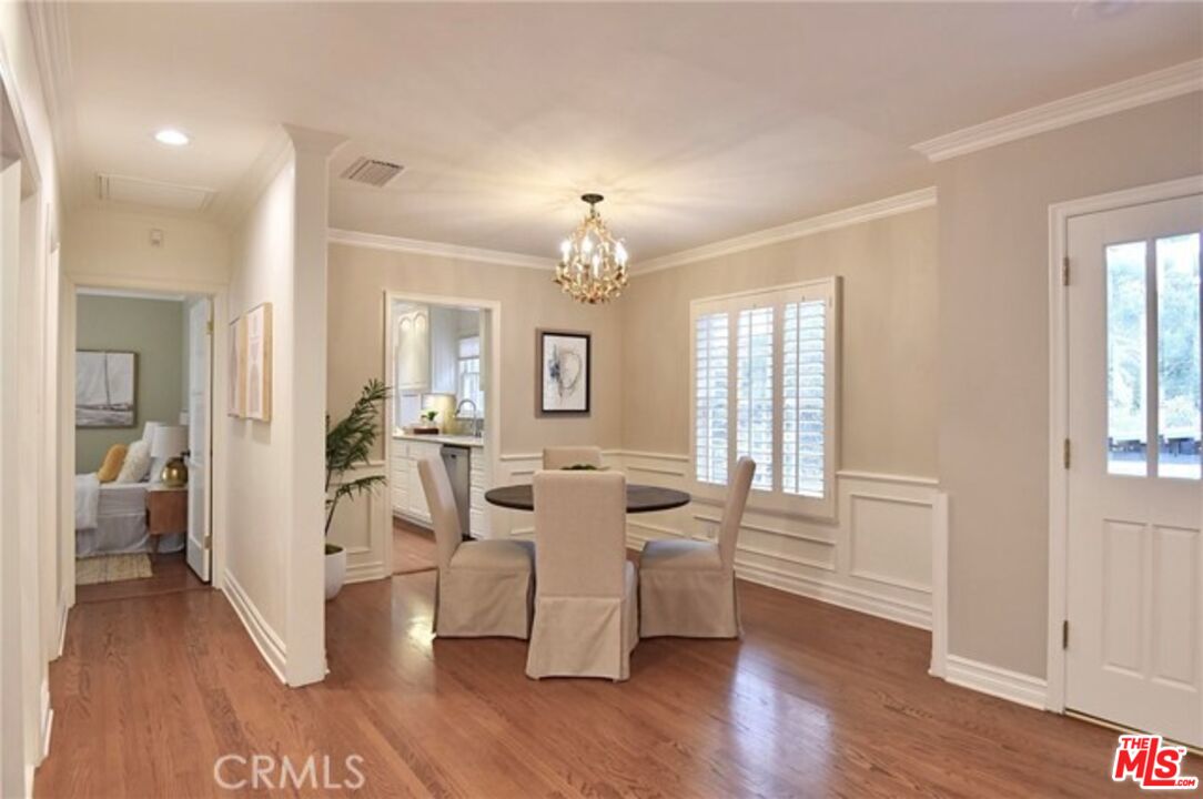 1308 Opechee Way Glendale, CA 91208 - Photo 7 of 33 a view of a dining room with furniture and wooden floor