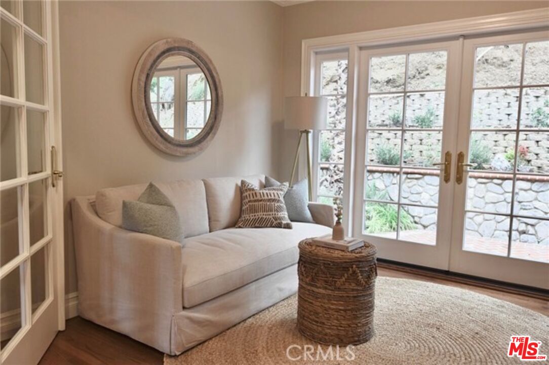 1308 Opechee Way Glendale, CA 91208 - Photo 8 of 33 a living room with furniture and a window