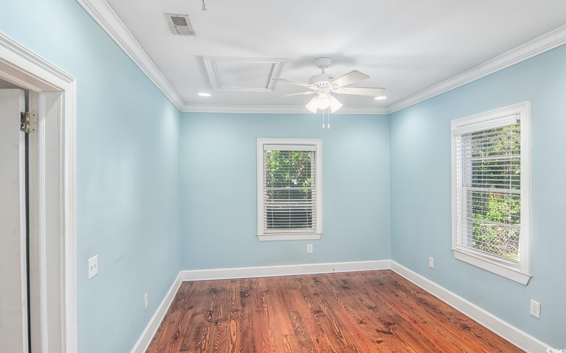 524 Highmarket Street Georgetown, SC 29440 - Photo 13 of 27 Spare room with ornamental molding, dark wood-type flooring, recessed lighting, attic access, and ceiling fan