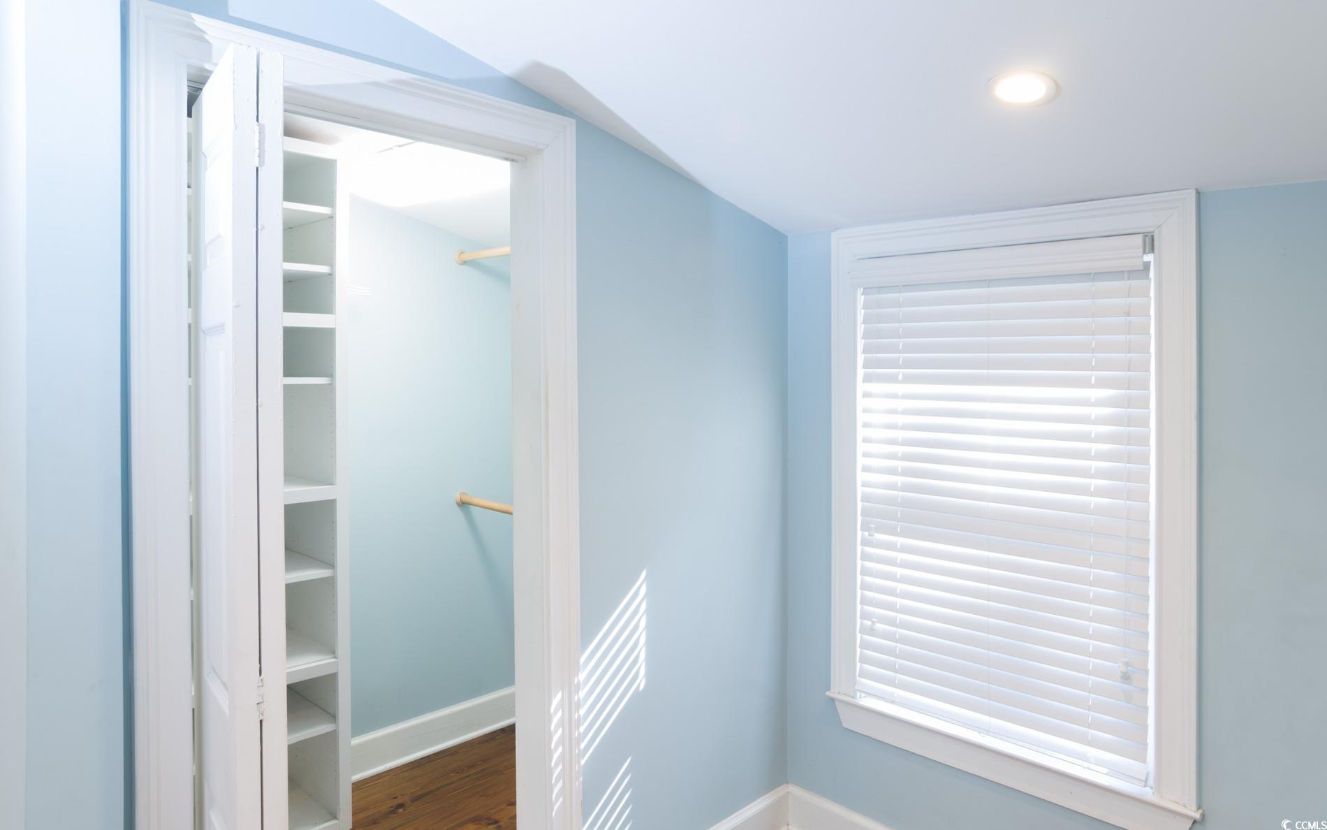 524 Highmarket Street Georgetown, SC 29440 - Photo 14 of 27 Spacious closet featuring dark wood-type flooring