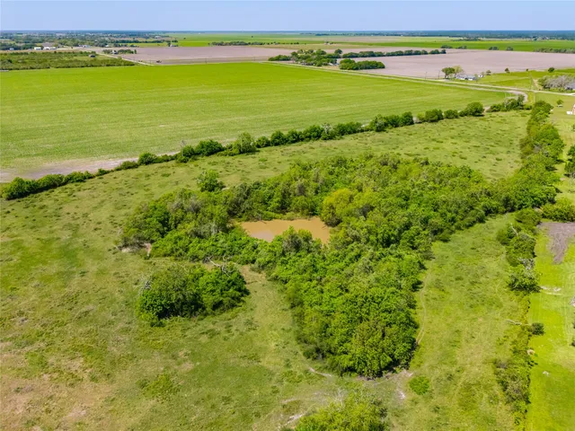 a view of an ocean and a yard