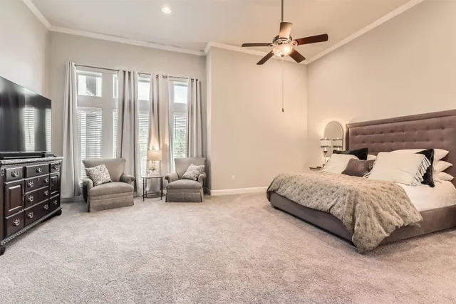 a bedroom with a bed and a table in it