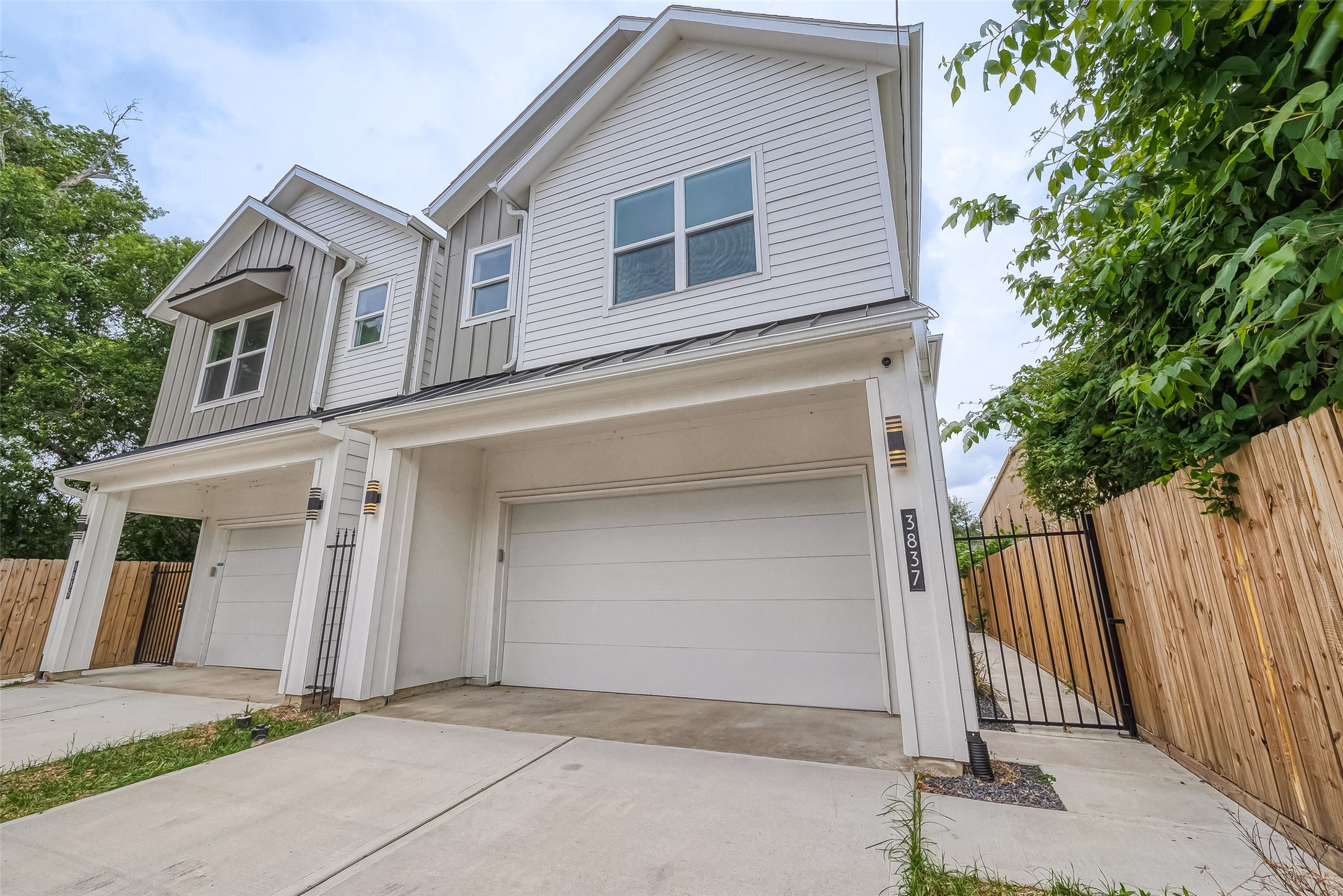 a front view of a house with a garage