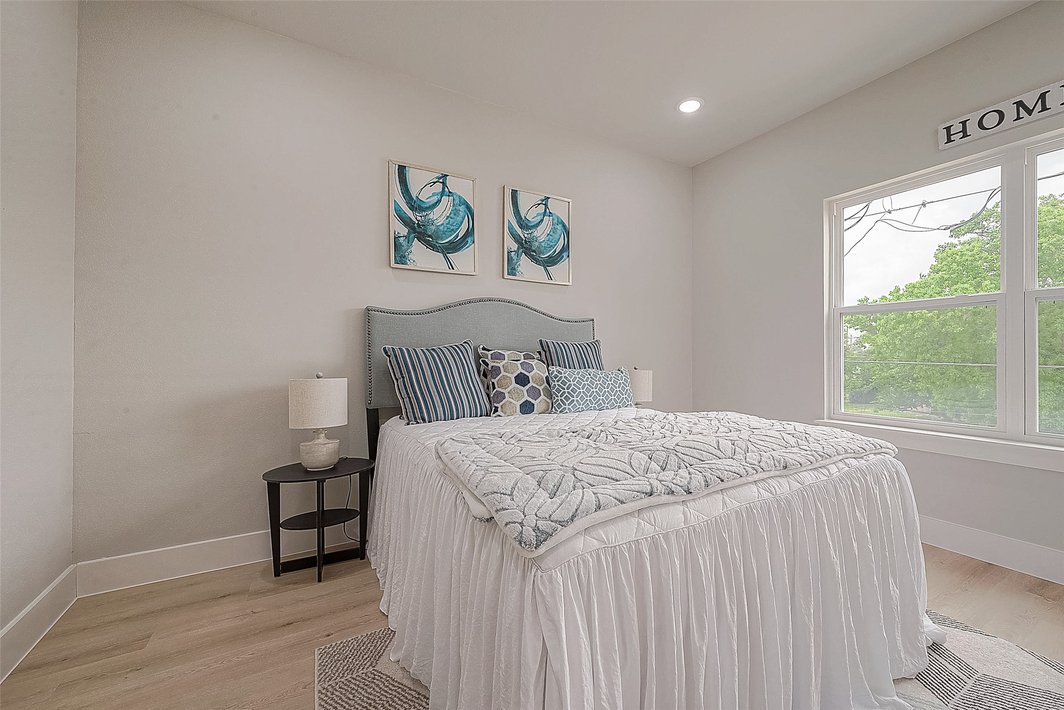 3835 Mainer Street Houston, TX 77021 - Photo 15 of 21 a bedroom with a bed and a window