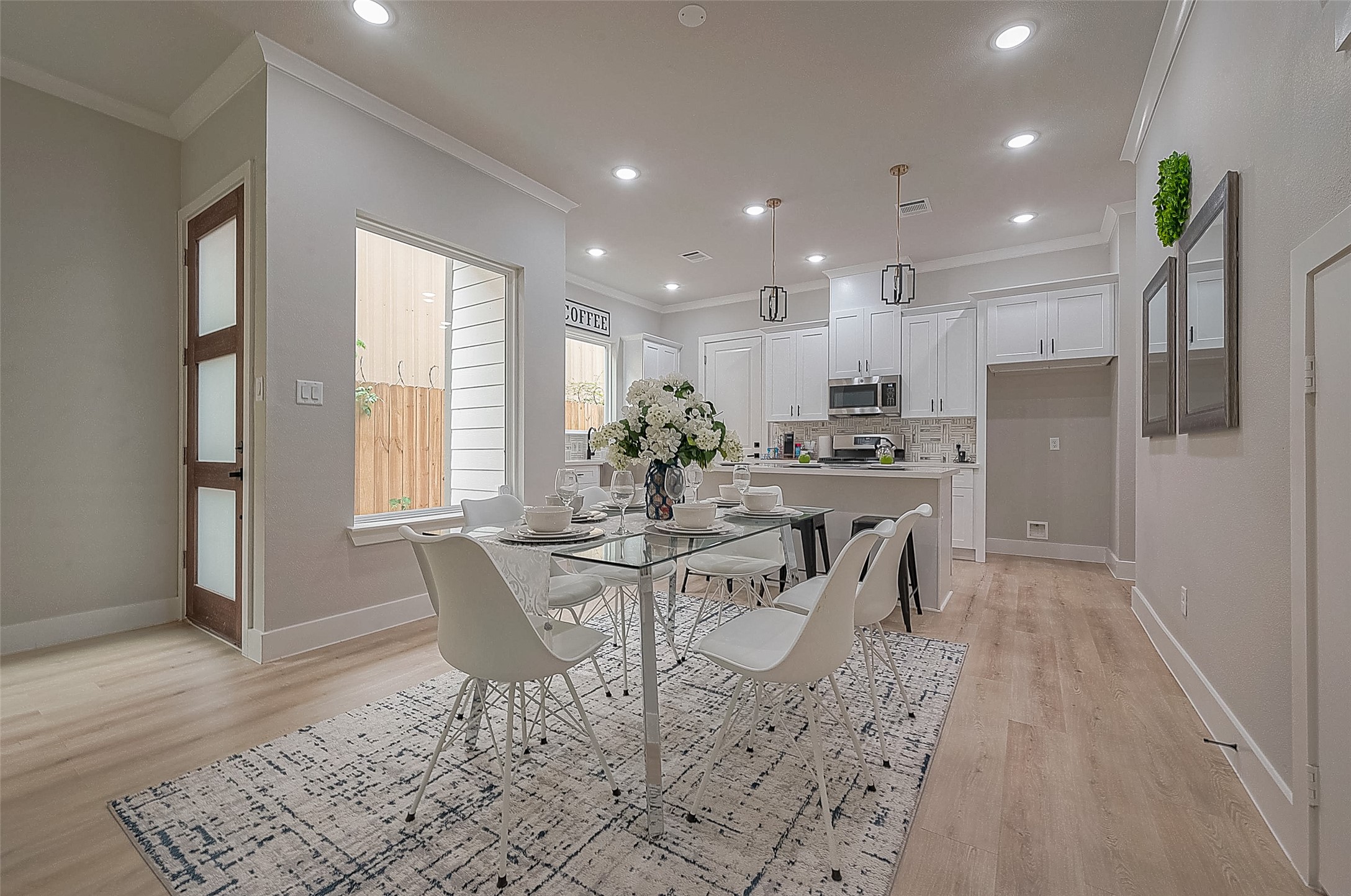 3835 Mainer Street Houston, TX 77021 - Photo 16 of 21 a view of a dining room with furniture and wooden floor