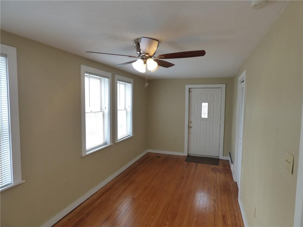 29 East Prospect Avenue, Unit 1 Pittsburgh, PA 15205 - Photo 16 of 30 a view of empty room with wooden floor and fan