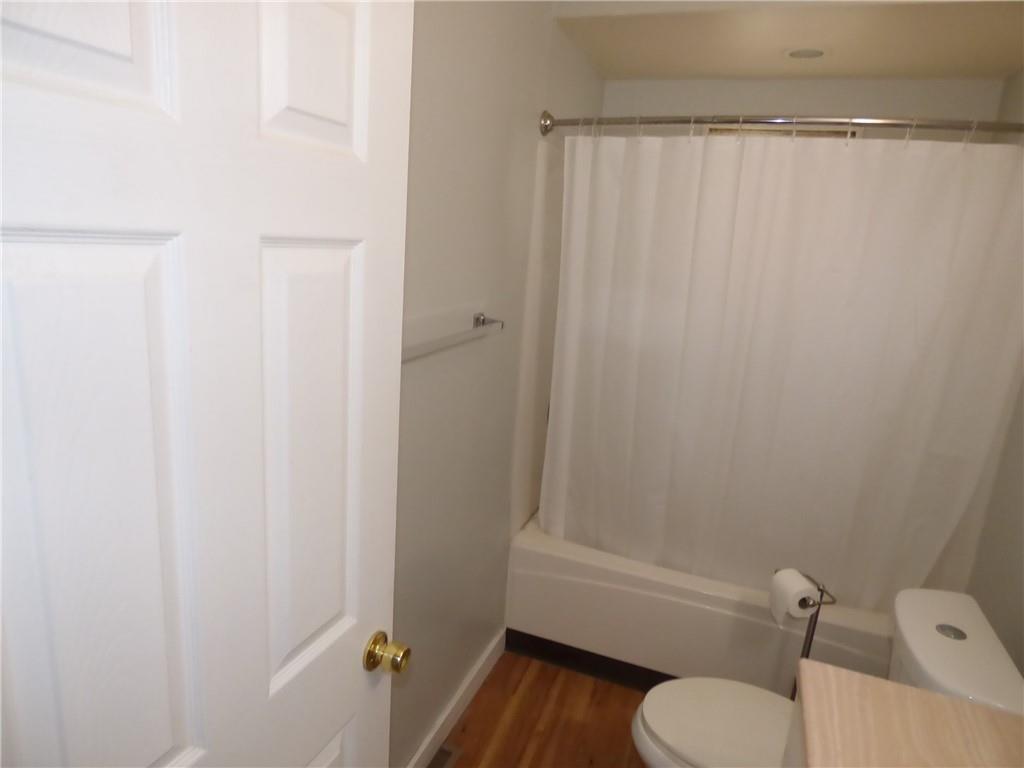 29 East Prospect Avenue, Unit 1 Pittsburgh, PA 15205 - Photo 21 of 30 a bathroom with a sink and a mirror