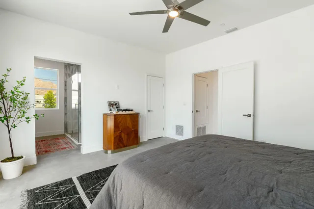 a bathroom with 2 sink and a mirror