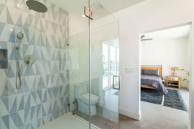 a kitchen with a stove and a refrigerator