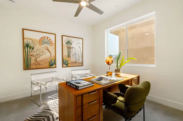 a view of a swimming pool with an outdoor space