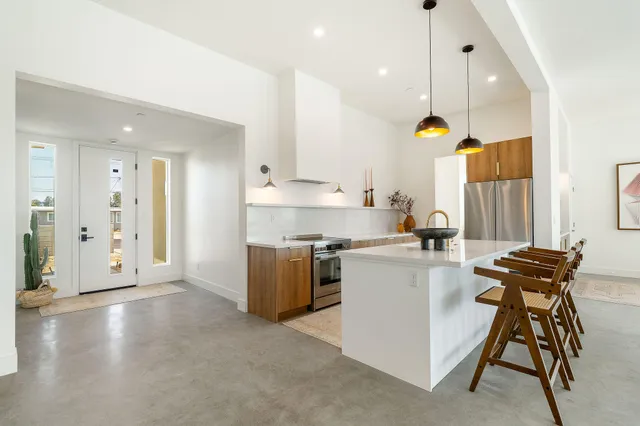 a en suite bathroom with a sink and mirror