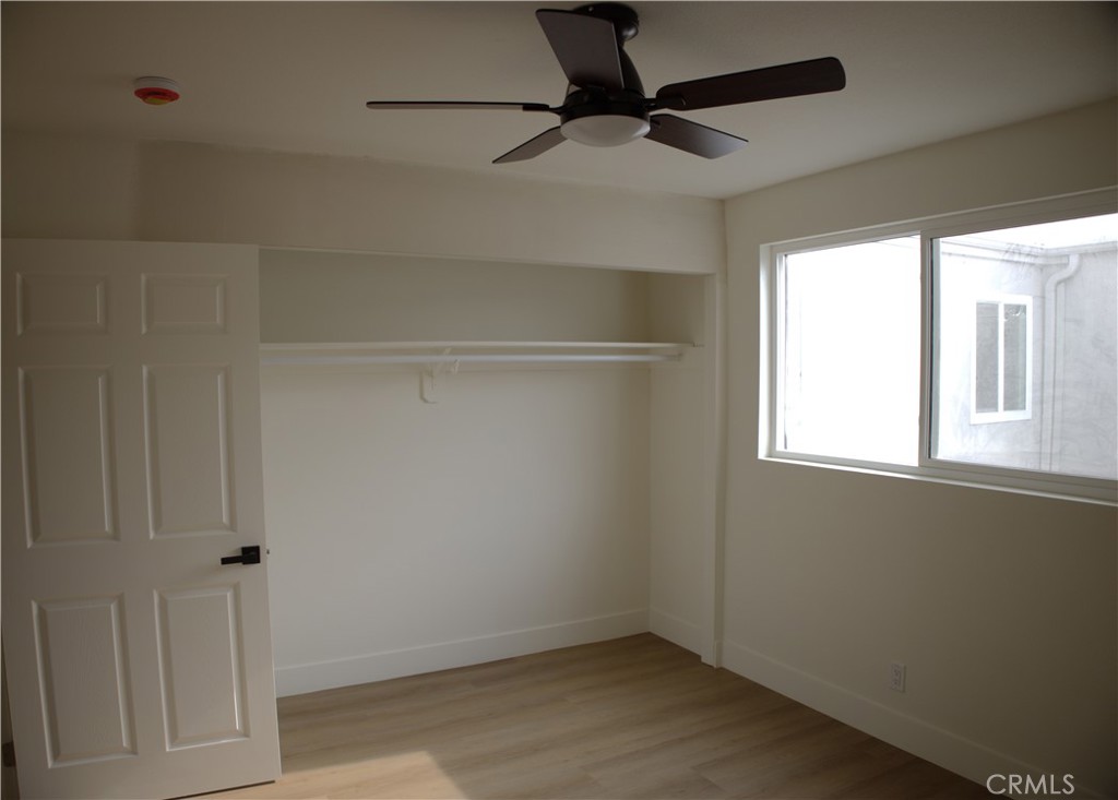 17420 Downey Avenue Bellflower, CA 90706 - Photo 11 of 11 a view of an empty room with a window