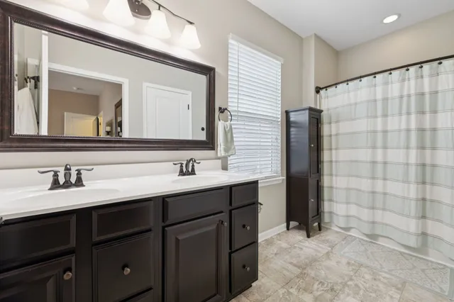a room with linen closet and wooden floor