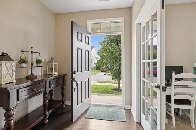 a view of staircase with lots of wooden floor and windows