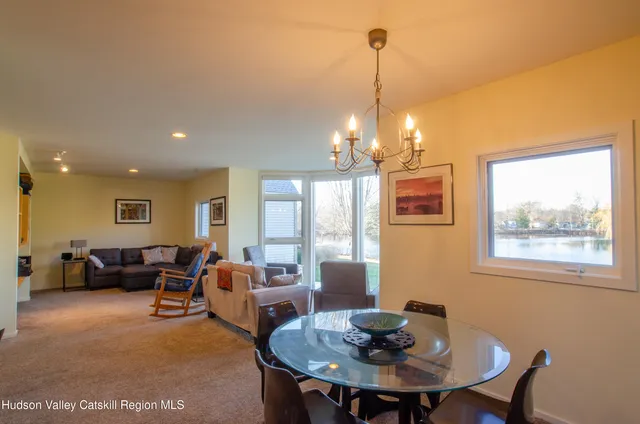 a view of a livingroom with furniture and window