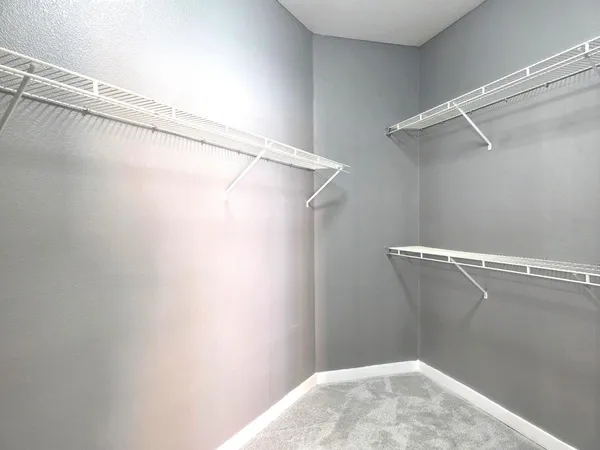 a view of a room with racks on the wall