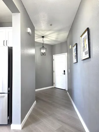 a view of entryway with wooden floor