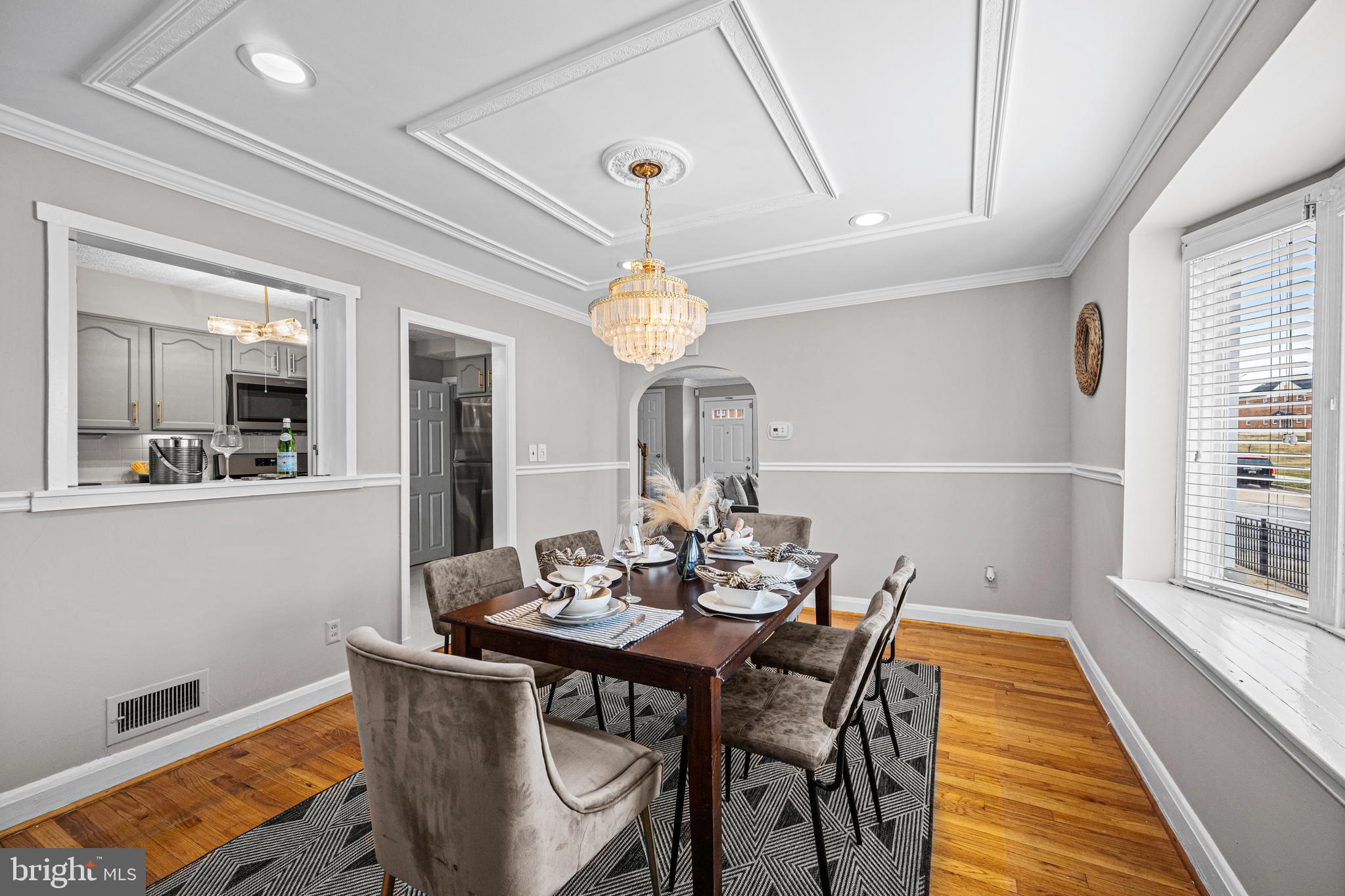 1935 Ramblewood Road Baltimore, MD 21239 - Photo 13 of 37 a view of a dining room with furniture and wooden floor
