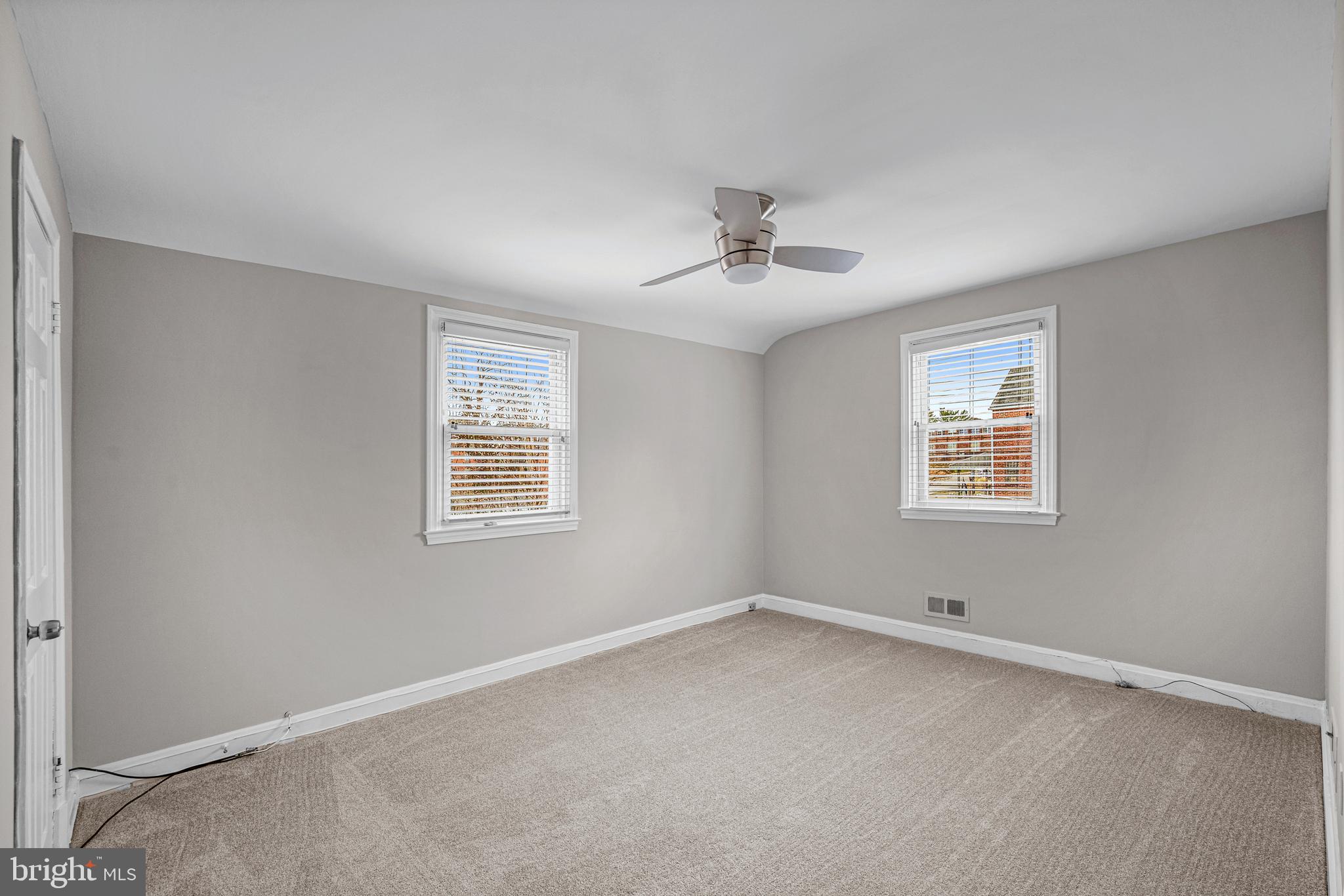 1935 Ramblewood Road Baltimore, MD 21239 - Photo 14 of 37 a view of an empty room with a window