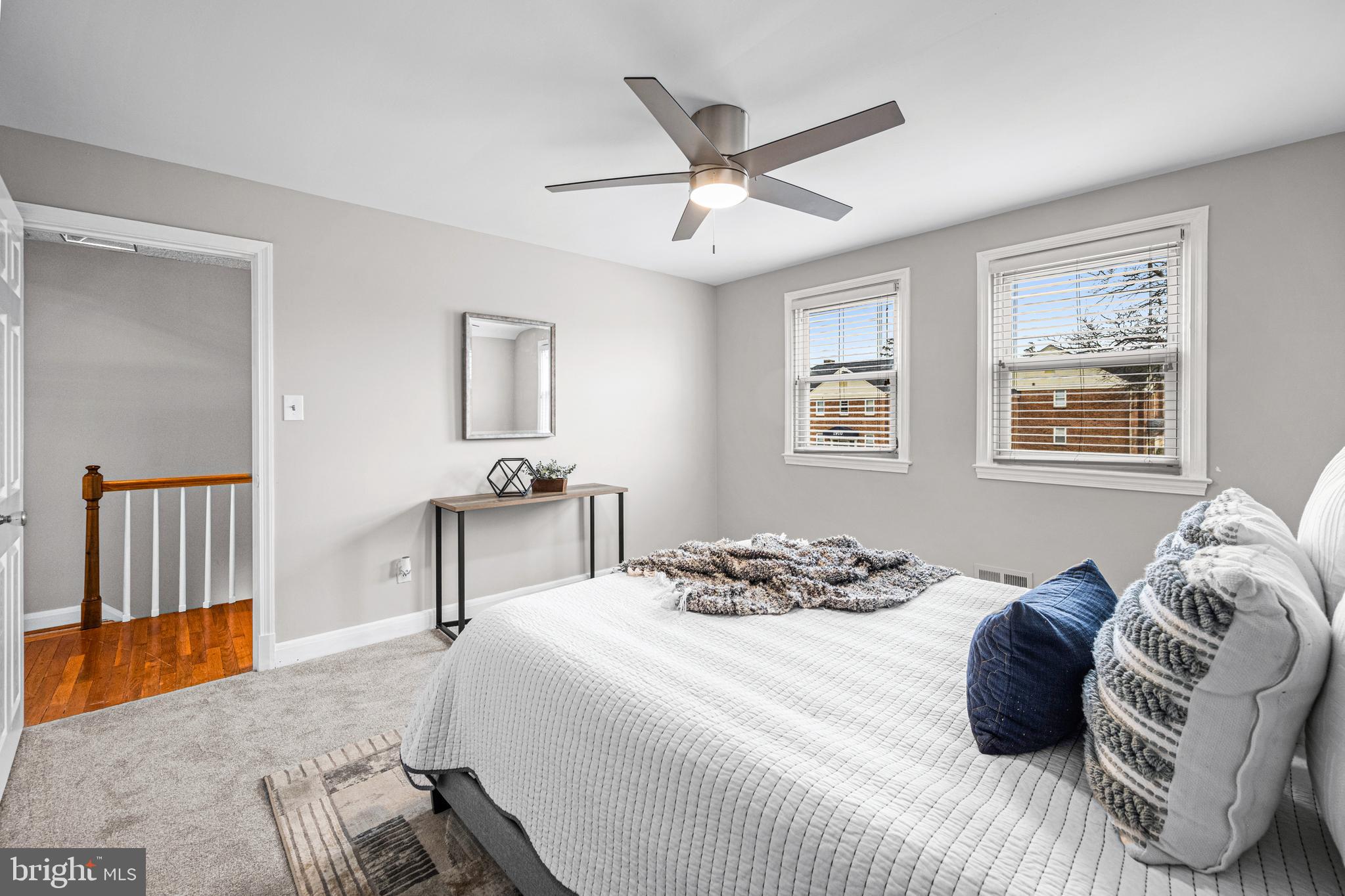 1935 Ramblewood Road Baltimore, MD 21239 - Photo 19 of 37 a bedroom with a bed and wooden floor