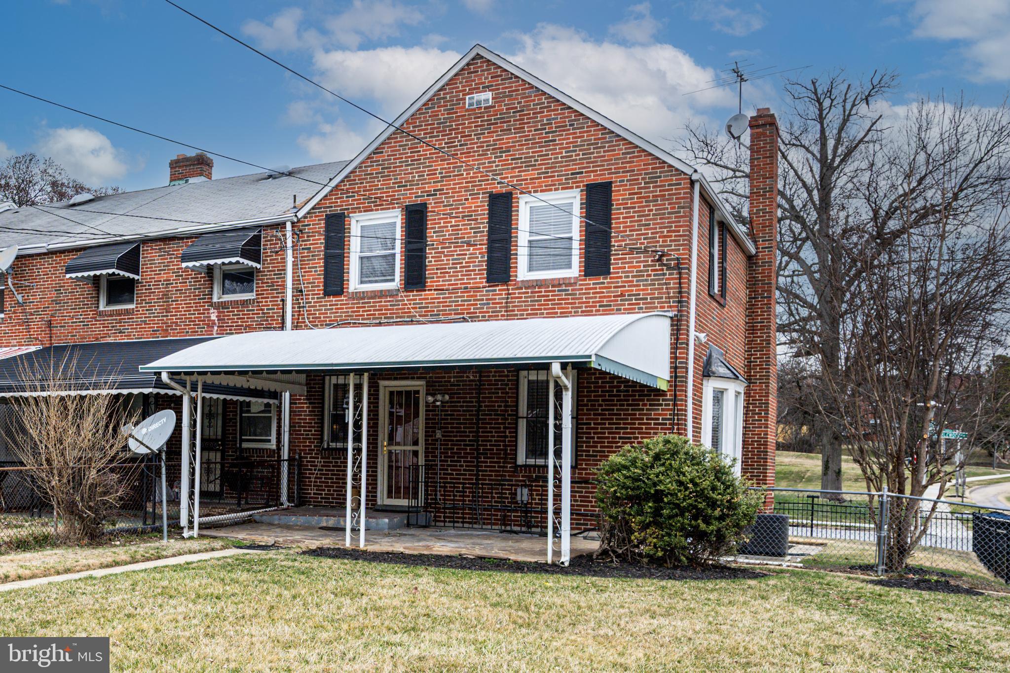 1935 Ramblewood Road Baltimore, MD 21239 - Photo 34 of 37 a front view of a house with a porch