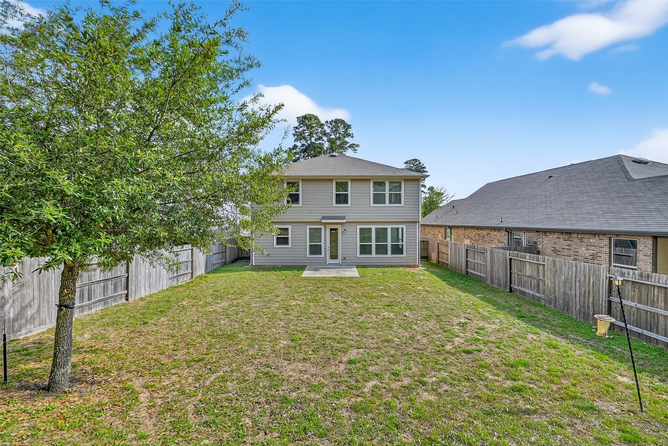 2107 Parnevik Place Conroe, TX 77304 - Photo 35 of 44 What activities can you imagine doing in this enormous back yard?
