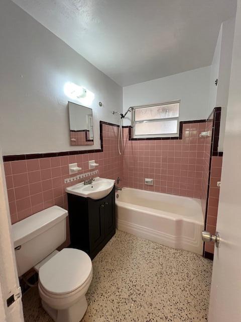 311 Inlet Way, Unit 10 Palm Beach Shores, FL 33404 - Photo 13 of 18 a bathroom with a sink a toilet and bathtub