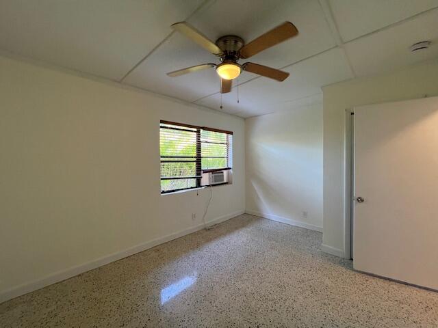 311 Inlet Way, Unit 10 Palm Beach Shores, FL 33404 - Photo 15 of 18 an empty room with windows and fan