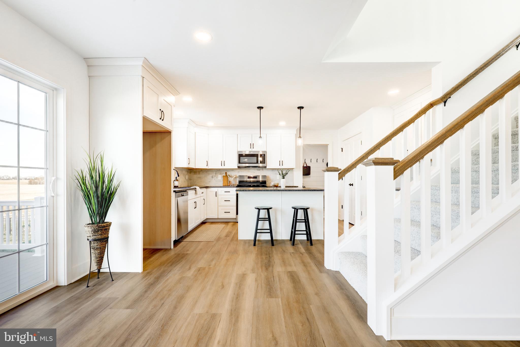 223 Coffee Goss Road Marietta, PA 17547 - Photo 7 of 19 a view of kitchen with furniture and wooden floor