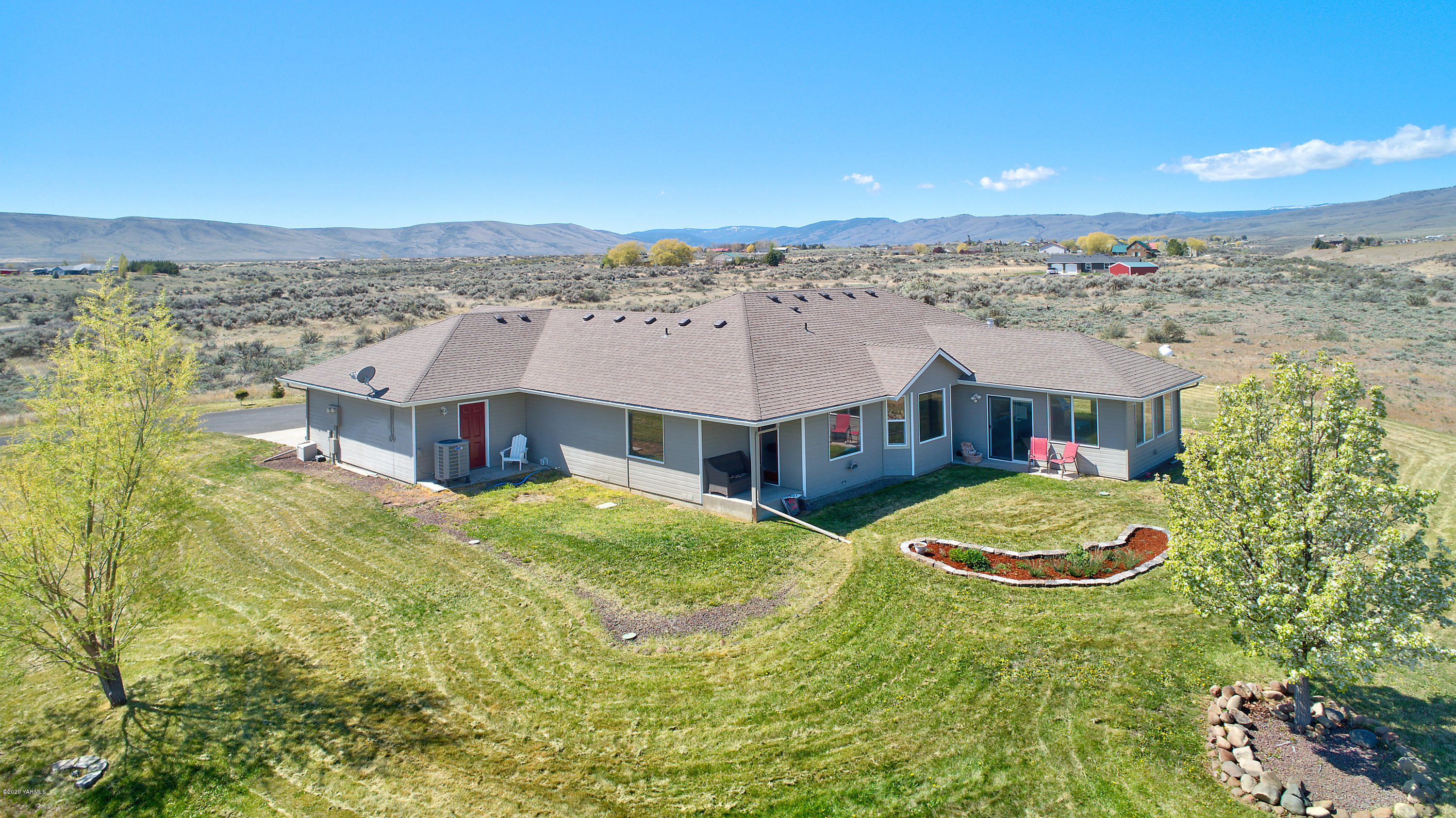 681 Red Tail Road Yakima, WA 98908 - Photo 3 of 21 a aerial view of a house with a yard