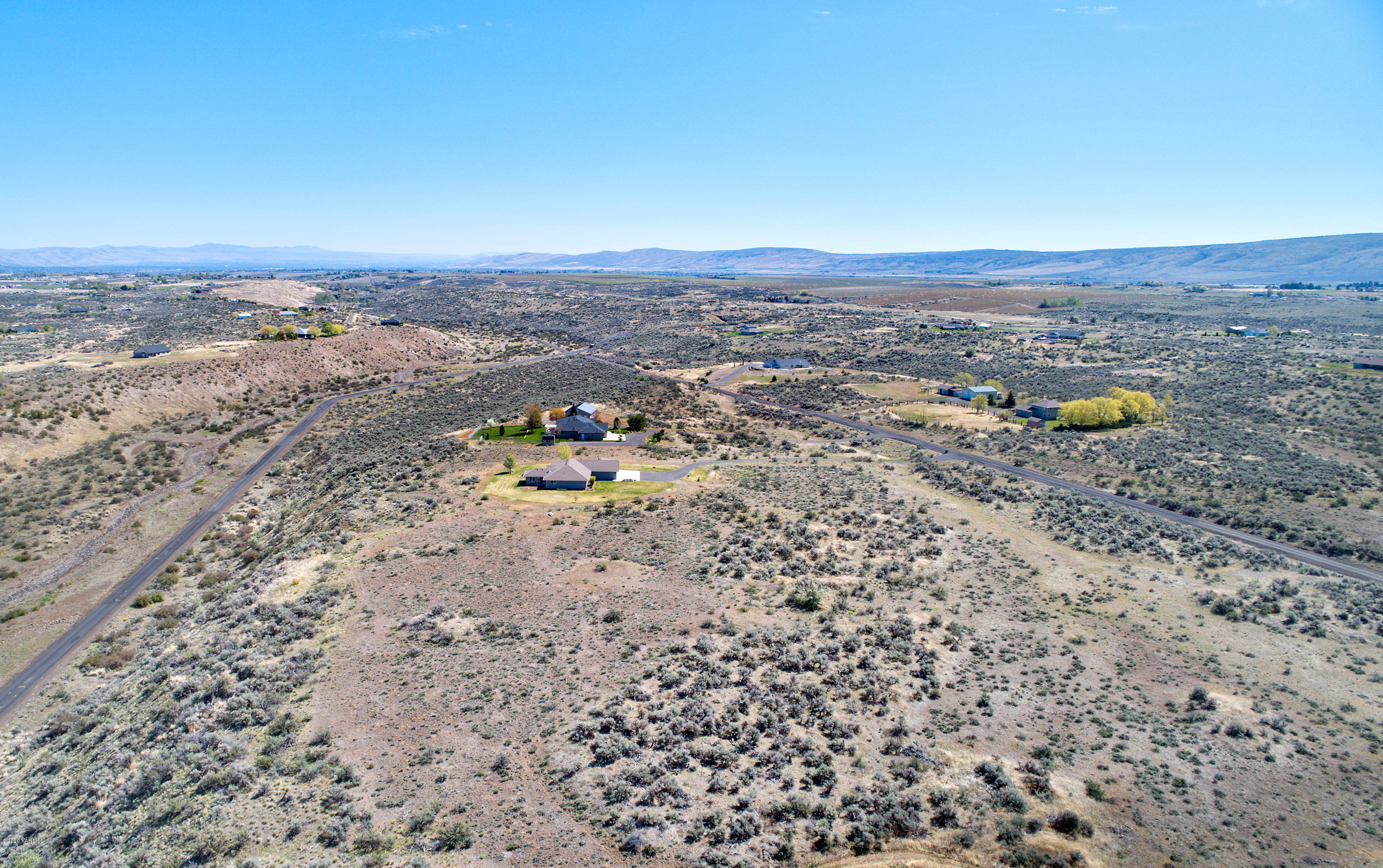 681 Red Tail Road Yakima, WA 98908 - Photo 4 of 21 an aerial view of a houses with a yard