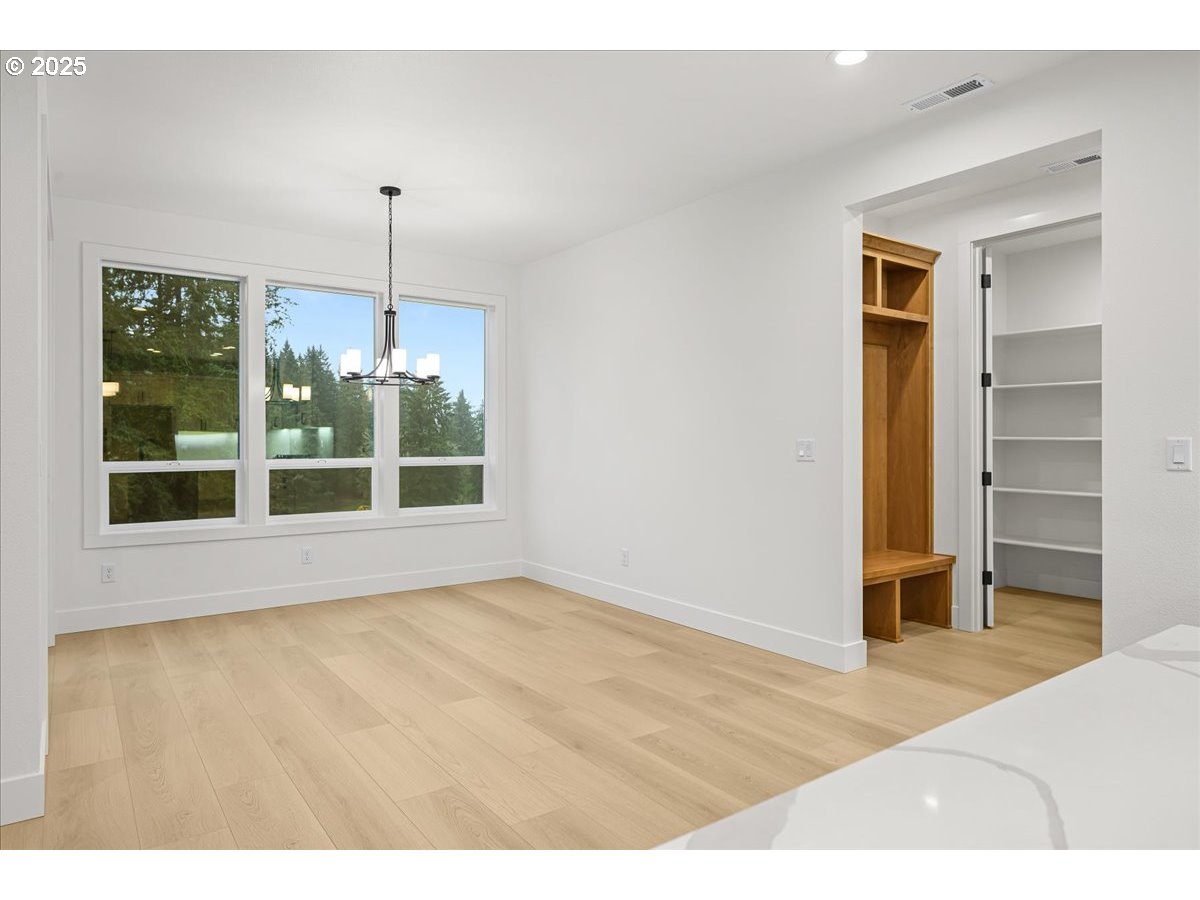 3518 North 11th Circle Ridgefield, WA 98642 - Photo 17 of 44 a view of an empty room with a window