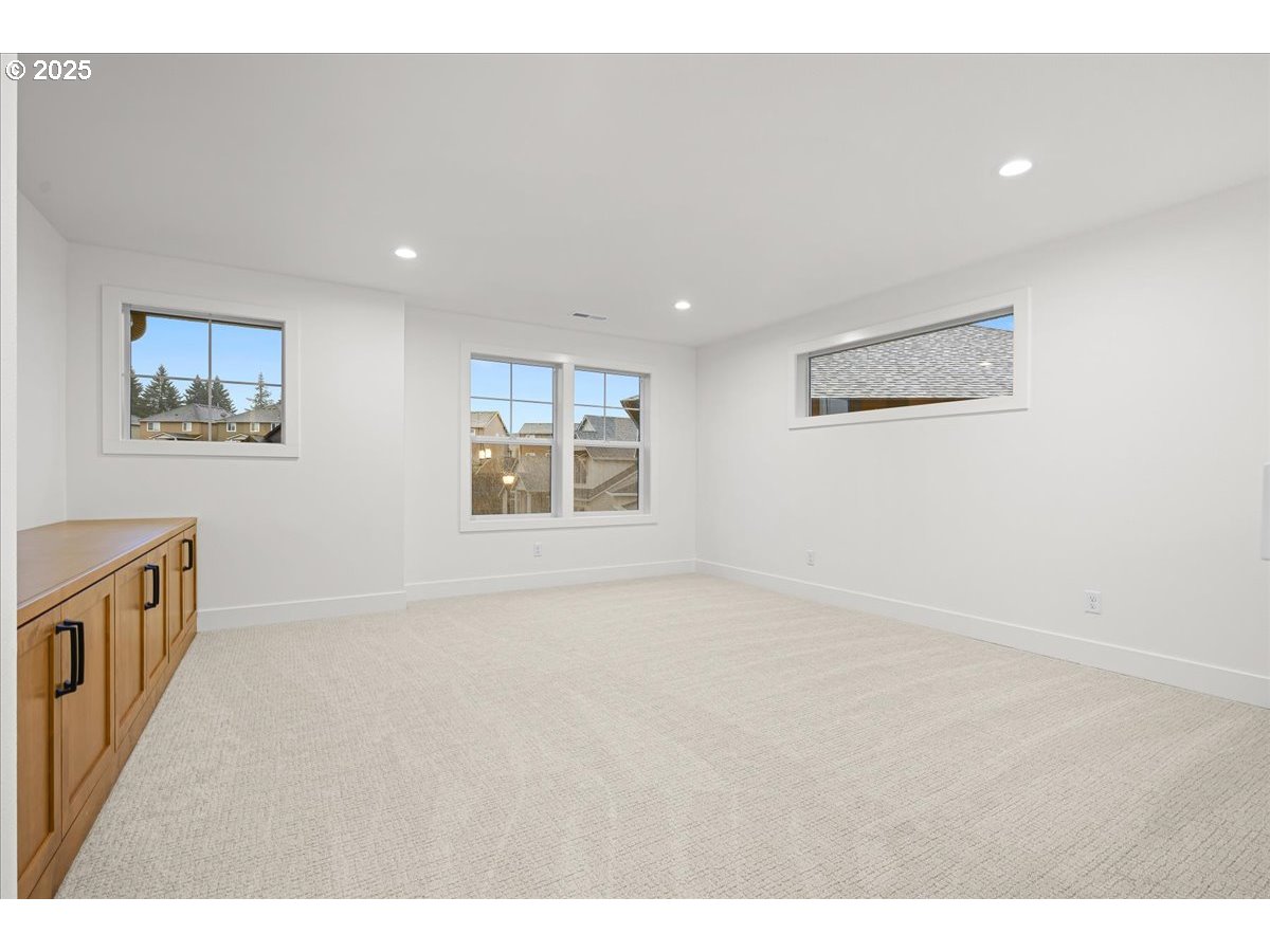3518 North 11th Circle Ridgefield, WA 98642 - Photo 23 of 44 a view of an empty room with a window